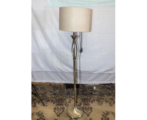 A standard lamp and shade