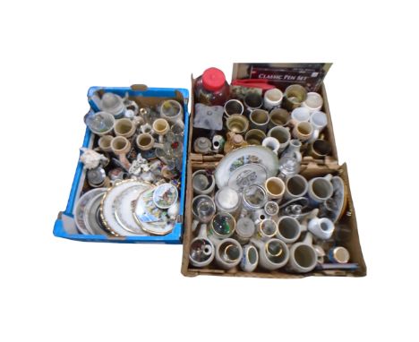 Three boxes of ceramics and glass, continental beer steins, mugs, drinking glasses, wall plates, light shade etc 
