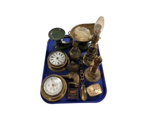 A tray containing Salter kitchen scales with weights, brass figural bells, ship's style wall clock and barometer, table lamp 