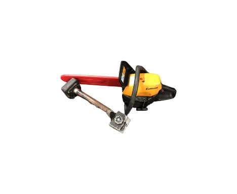 A California petrol chainsaw together with a carpet pusher.