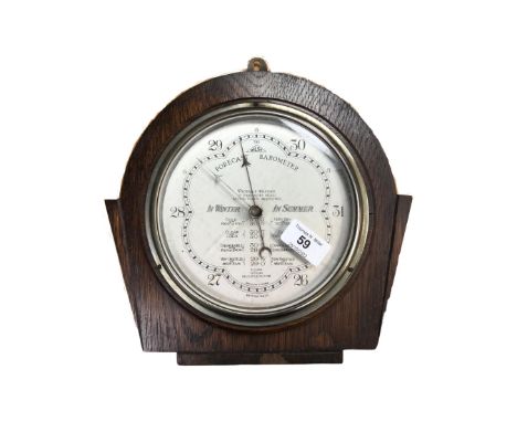 A 1930's Wilsn Forecast Barometer, made by R. Clark, Optician, Newcastle-on-Tyne, mounted on a board, overall dimensions 28 c
