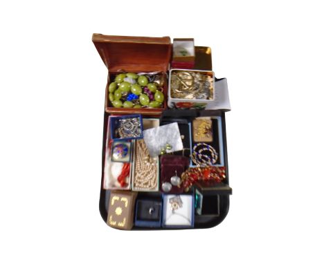 A tray of costume jewellery including Art Deco earrings, pendants on chains, faux pearl necklaces etc 