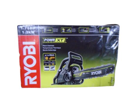 A Ryobi Power XT petrol chain saw, boxed 