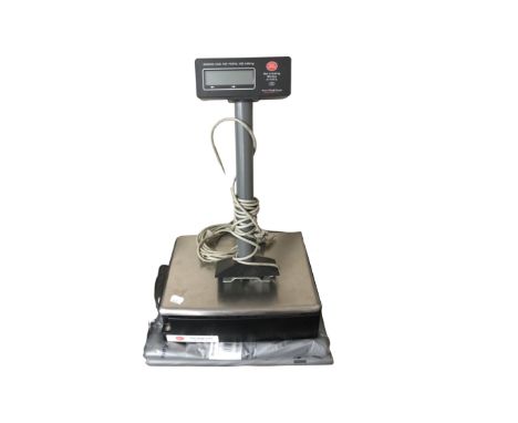 A set of electronic Avery post office scales 