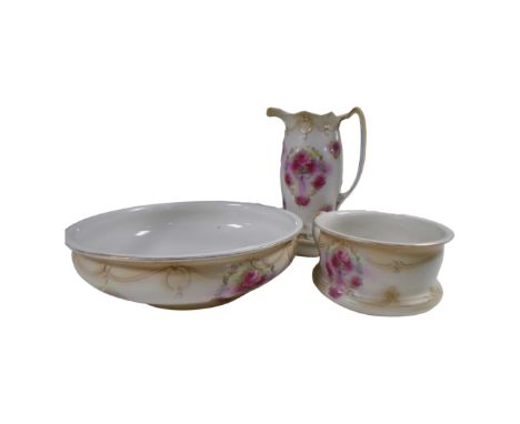 A 19th century wash jug, basin and chamber pot decorated in pink roses 