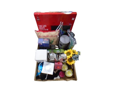Two boxes of Christmas lights and cushion, pedal bin, hurricane lamps, candles, cat door stop etc 