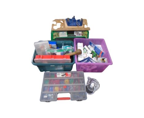 Two crates of multi compartment crates containing screws, nails, lion head door knocker, light bulbs, garden kneeler etc 