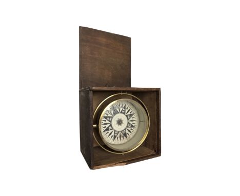 A brass cased ship's compass in box.