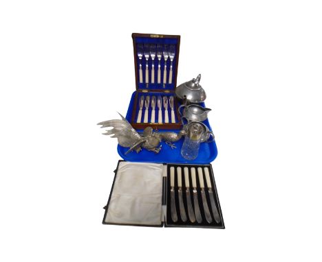 A tray of three piece plated tea service, metal bird ornaments, cased fish cutlery and butter knives 