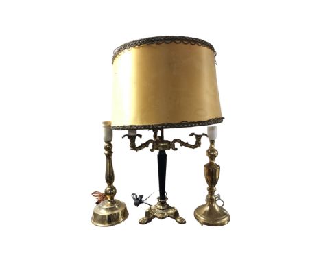 An early 20th century gilt metal three way table lamp with shade together with two further table lamps (continental wiring)