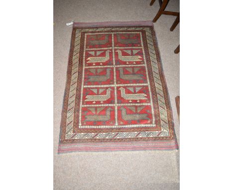 A Hunting Herathi rug decorated with ten panels of birds.