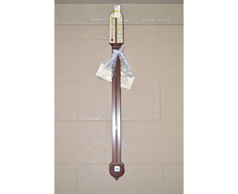 A reproduction stick barometer in mahogany case, in the style of Comitti (complete with instruction pamphlet).