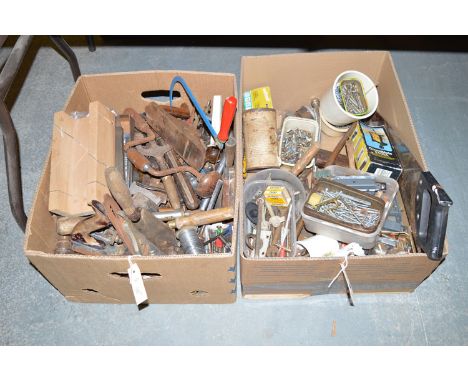A collection of miscellaneous hand tools; various fixings; and related sundries, in two boxes.