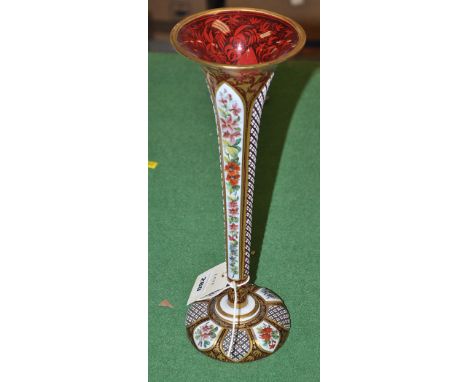 A Bohemian ruby, overlay and enamelled glass vase, 19th Century, with cut decoration and floral panels, circular base.