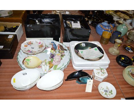 A large Royal Worcester flan dish; a Royal Crown Derby compote decorated sprays of flowers; two boxed Royal Doulton animals o