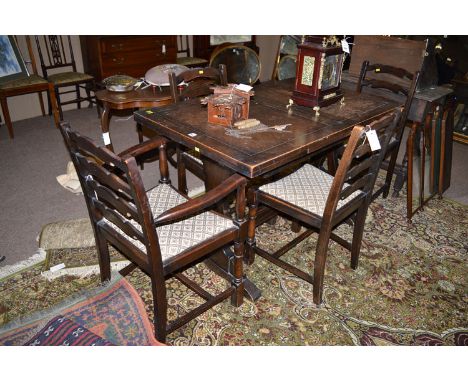 A six-piece carved and stained oak dining suite, comprising: a buffet style sideboard, a small rectangular draw leaf dining t