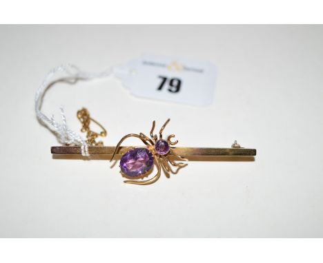 An amethyst set spider pattern bar brooch.