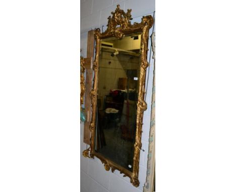 A gold painted rectangular wall mirror