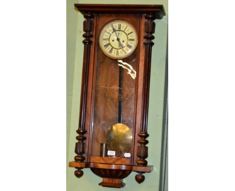 A double weight driven Vienna type wall clock 