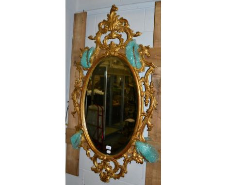An 18th century style gilt oval mirror 