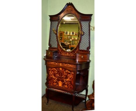 An Edwardian inlaid mahogany mirror backed sideboard, the upper section with oval mirror plate flanked by pierced fretwork ab