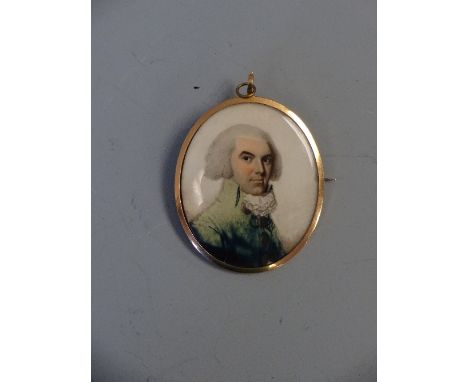 AN OVAL PORTRAIT MINIATURE, in yellow metal oval pendant brooch case with label verso inscribed 'Miniature of a Man by John B