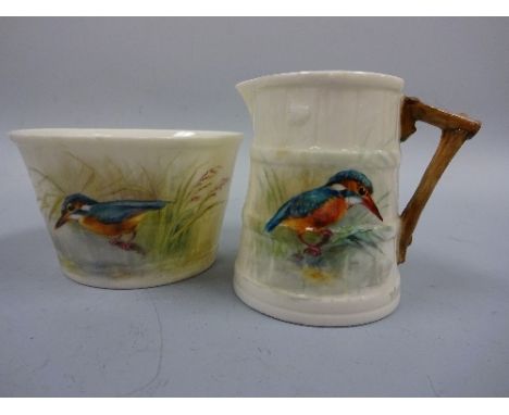 A MATCHING ROYAL WORCESTER BARREL MOULDED JUG AND BOWL, hand painted with Kingfisher in reeds, signed W Powell, green marks t