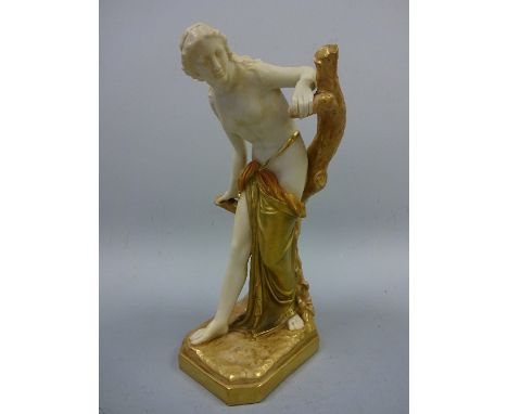 A ROYAL WORCESTER FIGURE, The Bather Surprised, modelled by Sir Thomas Brock, partially clothed female supported on tree stum