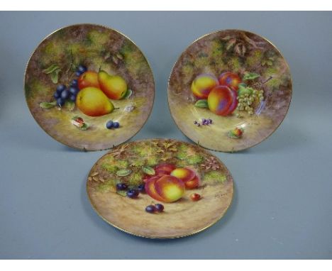 THREE HAND PAINTED ROYAL WORCESTER CABINET FRUIT PLATES, pears, grapes, peaches and white grapes, signed H Ayrton and peaches