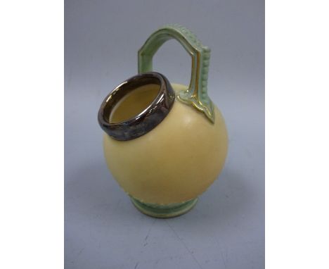 A ROYAL WORCESTER SALT PIG, with beaded turquoise handle and heart strapwork foot to buff blush ivory ground, silver collar, 
