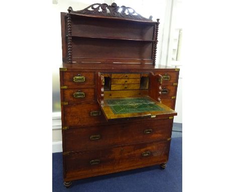 A MAHOGANY CAMPAIGN CHEST, with fitted walnut secretaire central leather topped fall front flanked by two sets of two short d