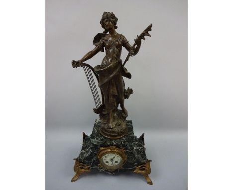 A FIGURAL MANTEL CLOCK, with spelter maiden with harp with plaque, 'La Melodie par Aug Moreau' on stepped marbled base with o