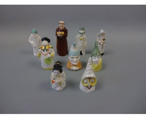 NINE ROYAL WORCESTER CANDLE SNUFFERS, comprising Owl, Punch, Toddie, Budge, Mandarin, Japanese Girl, Mr Caudle, a Monk and a 