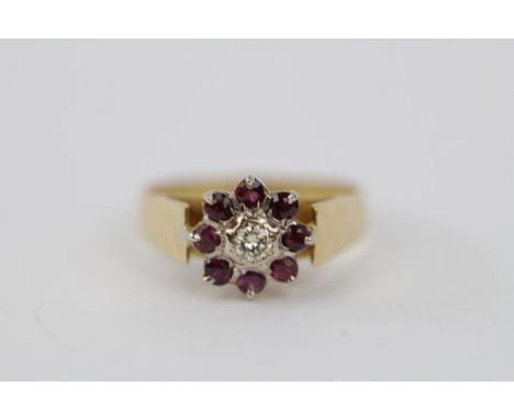 Ladies 18ct Gold Ruby &amp; Diamond set cluster ring Size L. 3.8g total weight 