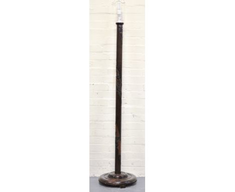 Far Eastern carved hardwood standard lamp, circular base, height (excluding fitment) 158cms.