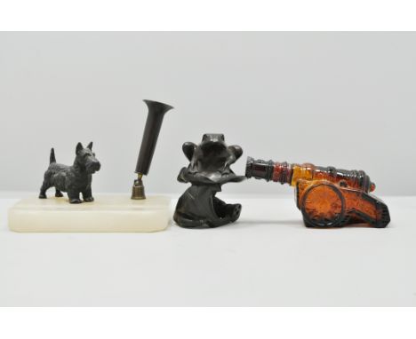 Alabaster desk stand, modelled with a cold painted Terrier, width 14cms, an Avon glass novelty flask and a model of a Frog on