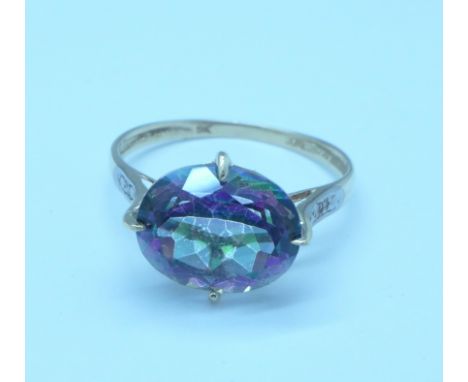 A 9ct gold, mystic topaz and diamond ring, lacking one small diamond, 1.7g, O