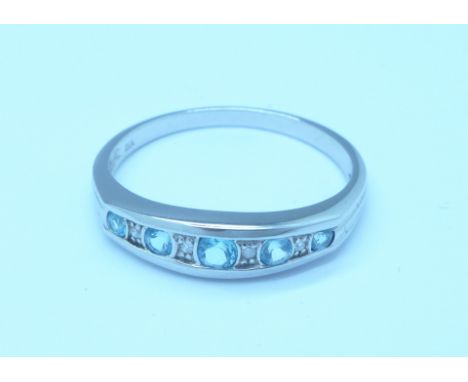 A 9ct white gold, topaz and diamond ring, 2.8g, V
