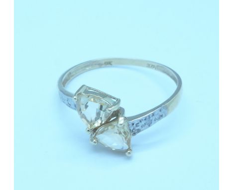 A 9ct gold, citrine and diamond ring, 1.2g, P
