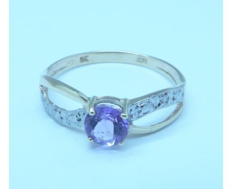 A 9ct gold, amethyst and diamond ring, 1.1g, O