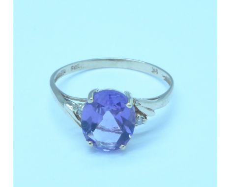A 9ct gold, amethyst and diamond ring, 1.3g, O