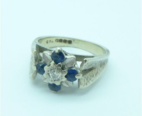 An 18ct gold, sapphire and diamond ring, 6.1g, L