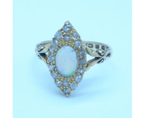 A Victorian 22ct gold, opal and diamond navette shaped ring, 4g, N