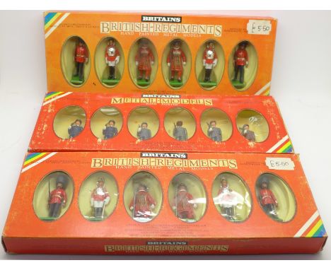 Three sets of Britains model figures; two British Regiments, both set 7226, and one 7302, US Marines