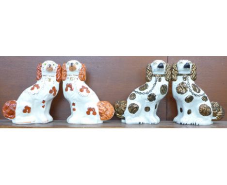 Two pairs of Staffordshire dog figures