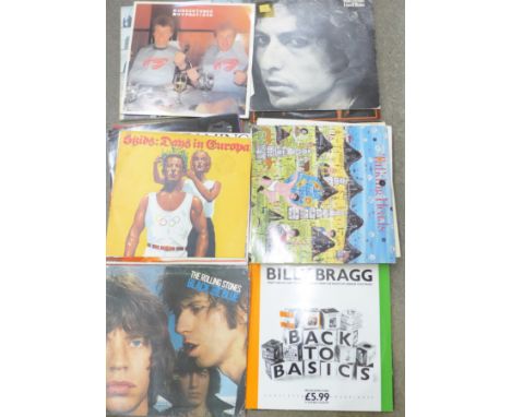 A quantity of LPs mainly 1970s including Bob Dylan, The Rolling Stones, Undertones, The Cranberries and Talking Heads