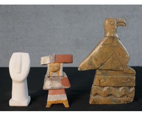 A collection of figures, including a white marble Cycladic head, a carved hardstone bird figure and a ceramic Aztec figure. H