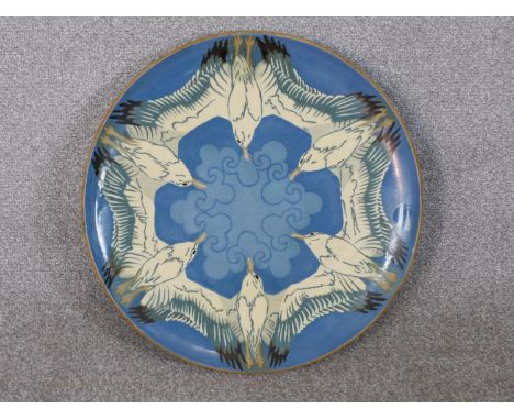 Danish Herman Kahler (HAK), a large ceramic glazed charger with seagull design on pale blue ground, signed verso and stamped 