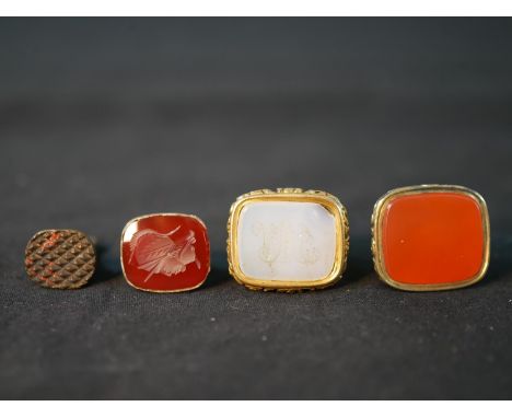 Four 19th century rolled gold, brass and 9ct gold seal fobs, the 9ct gold fob with carved agate inset showing a portrait of m