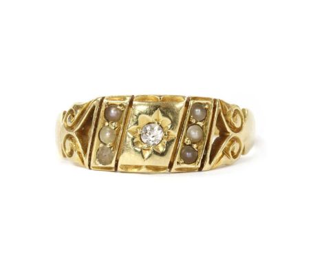A Victorian gold diamond and split pearl ring, with a Swiss cut diamond star set to the centre, with a row of split pearls gr